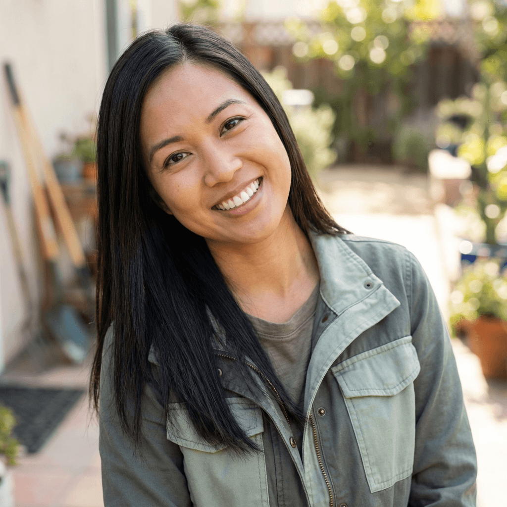 Emily Rodriguez smiling in a cozy living room